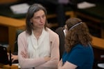 Rep. Maxine Dexter, D-Portland, left, speaks with Rep. Julie Fahey, D-Eugene, on the House floor at the Oregon State Capitol in Salem on Tuesday, Feb. 28, 2023.
