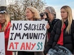 Advocates and victims of the opioid crisis gather outside the U.S. Supreme Court on Dec. 4, 2023, while the justices hear a case about Purdue Pharma's bankruptcy deal. The protesters urged justices to overturn the deal, which would give the Sackler family immunity against future civil cases related to opioids.