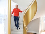 Host Jack McBrayer taking in the sights of the "Golden Saxophone House."