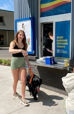 UO acrobat and tumbler Emily Rezner with dog, Maverick, on a photo and video shoot for Dutch Bros coffee company on May 8, 2025 in Eugene, Ore. Rezner is working with the UO student organization Oregon Accelerator to explore NIL opportunities.