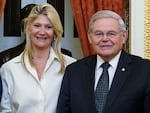 Senate Foreign Relations Committee Chairman Sen. Bob Menendez, D-N.J., and his wife Nadine Arslanian, pose for a photo on Capitol Hill in Washington, Dec. 20, 2022. U.S. Sen. Bob Menendez of New Jersey and his wife have been indicted on charges of bribery.