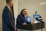 Daniel Cortez, president of the Oregon chapter of the American Postal Workers Union, joined Oregon Secretary of State Tobias Read at a news conference in Portland on Oct. 13, 2026.