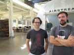 XOXO Festival co-founders Andy Baio and Andy McMillan in their new creative co-work space, the XOXO Outpost (complete with an Airstream trailer that's being converted into a podcast studio).