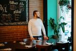 Samer Hafez in his restaurant Aleppo Supper Club in Berlin.