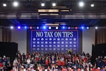 President Trump speaks at a rally at Circa Resort & Casino on Saturday. The event focused on Trump's first week in office, including his proposed policy to eliminate taxes on tips for service industry employees.
