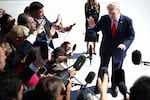 President Donald Trump stops to speak to members of the media as he departs on the South Lawn of the White House on October 13, 2026 in Washington, D.C. elections.