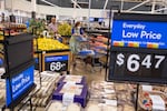 FILE - People buy groceries at a Walmart Superstore in Secaucus, New Jersey, July 11, 2024. (AP Photo/Eduardo Munoz Alvarez)