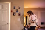 Single mom Adrienne Rumley gets herself and her 2-year-old daughter, Lorelei, ready in the wee hours of the morning in Winchester, Va.