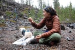 Marcela Fernandez holds crystals from other glaciers she's visited Sunday, Oct. 18, 2020.