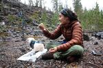 Marcela Fernandez holds crystals from other glaciers she's visited Sunday, Oct. 18, 2020.