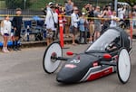 The Warn Industries soapbox wins its race, flying across the finish line.