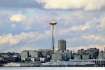 Sun rays shine on the Space Needle on Wednesday, Oct. 23, 2024, in Seattle.