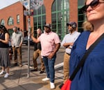 People take a tour of the sites purchased by 1803 Fund.