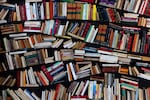 A bookshelf set up in the street during a literature festival. (Joel Saget/AFP via Getty Images)