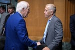 Sen. John Cornyn, Republican from Texas, (left) speaks with Senator Thom Tillis, Republican from North Carolina, (right) during a Senate Finance Committee hearing on July 30.