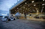 The P-3 research plane leaving its hangar at NASA's Wallops Flight Facility in Virginia.