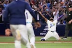 Tampa Bay Rays third baseman Junior Caminero celebrates their win against the Cleveland Guardians in Game 6 of an American League Championship Series baseball game in St. Petersburg, Fla. Monday, Oct. 19, 2026.