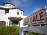 Lower mortgage rates are expected to spur more buyers to enter the housing market. A house for sale in Los Angeles last month is seen here.