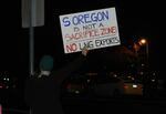 Opponents of the Jordan Cove LNG export terminal in Coos Bay rallied outside a public meeting in Medford Thursday.