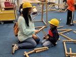 Shaheen Aamir and her son play together at a children's museum. Aamir says participating in the SAHELI diabetes prevention program made a difference in her energy and helped her learn to cook healthier for her family.