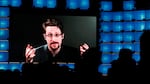 From Moscow, former U.S. National Security Agency contractor Edward Snowden addresses a technology conference in Portugal in 2019. Snowden fled the U.S. in 2013 and revealed highly classified U.S. surveillance programs. He's been living in Russia for the past decade, and received Russian citizenship last year.