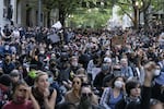 Massive crowds gathered in Portland for a fourth evening of protests over the killing of George Floyd, a Black man from Minneapolis who was killed after an officer pushed his knee into his neck for nearly nine minutes on June 1, 2020. Unlike previous nights of protests, there was a limited police presence on Portland streets, and demonstrators remained peaceful throughout five hours of marching.