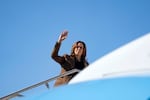 US Vice President and Democratic presidential candidate Kamala Harris waves as she boards Air Force Two from Sky Harbor International Airport in Phoenix, Arizona, on Friday.