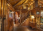 Steiner cabins on Mount Hood are renowned for their playful use of curving logs. This staircase, photographed in October 2024, was made by craftsman Henry Steiner in 1930 with a sweeping line made of logs from the local forest. “Each piece of wood seemed to speak to him,” said the late Lloyd Musser, former director of the Mt. Hood Museum and a leading authority on Steiner’s work. “He saw not just a log, but a banister with its own whimsy.”