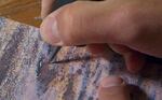 Artist Ben Buswell uses a tool to etch into his photographs, giving the illusion of depth.