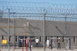 People detained are seen at the the Desert View Annex at the the private prison company GEO Group Adelanto ICE Processing Center detention facility in Adelanto, Calif., in July 2025.