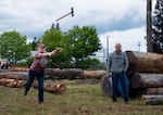 Martha Nicholas competes in the ax-throwing event.