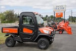 Kubota vehicles sit on the lot at Dan's Tractor Inc. on Tuesday, June 18, 2019, near Battle Ground, Wash.