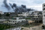 Smoke billows from a mosque following an Israeli air raid Dec. 31, 2008, in Gaza City.