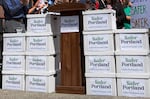 FILE - The Safer Portland campaign holds a press conference July 6, 2026 in Portland, Ore., announcing the signature requirements for the November 2026 ballot measure were met. The proposal aims to hire more police officers using Portland's Clean Energy Fund.