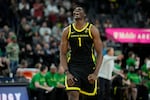 Oregon center N'Faly Dante (1) celebrates as Oregon defeats Colorado in an NCAA college basketball game in the championship of the Pac-12 tournament Saturday, March 16, 2024, in Las Vegas.