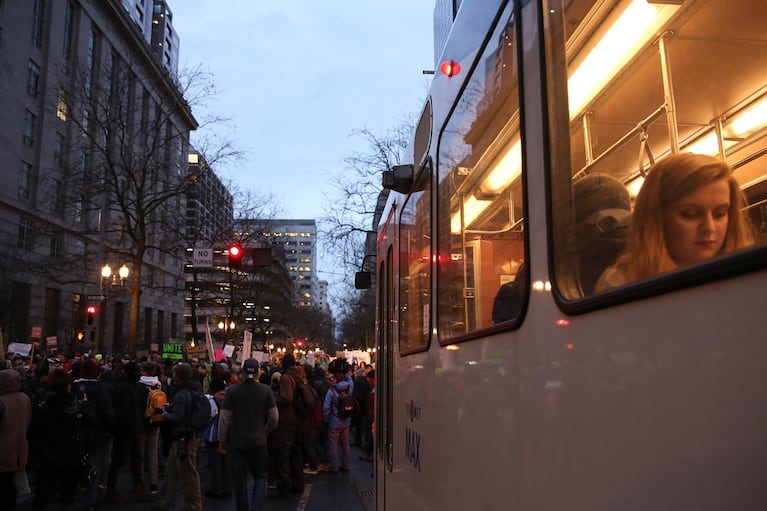 Protesters shut down the 6th Avenue transit mall, leaving many commuters stuck on the MAX trains during Inauguration Day demonstrations in Portland on Jan. 20, 2017.