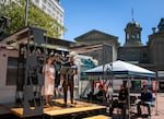 Opera a la Cart performers sing together in Pioneer Square in downtown Portland on Aug 13, 2025.