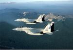 Two F-15 jets from the Kingsley Air Field fly over Southern Oregon.  