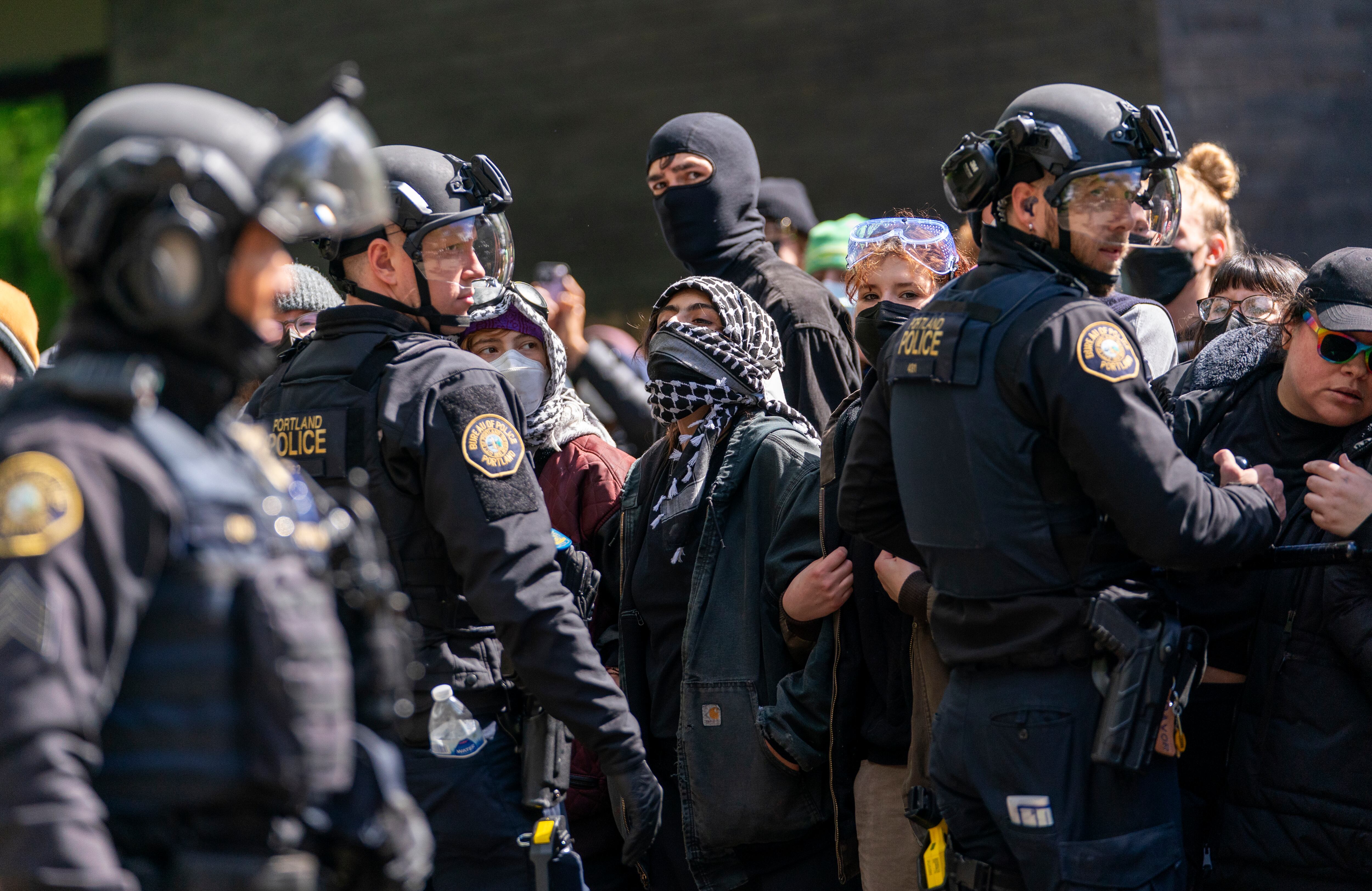 Law enforcement teams clear protesters from Portland State University’s Branford Price Millar Library, May 2, 2024. People protesting Israel's role in the war in Gaza had occupied the library since Monday evening.