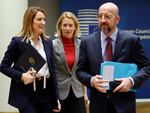 From left, European Parliament President Roberta Metsola, Estonia's Prime Minister Kaja Kallas and European Council President Charles Michel arrive to a round table meeting at an EU summit in Brussels, Thursday. "Ukraine is our priority and this agreement will give the credibility, legitimacy and the predictability that is expected from us," Metsola said.