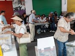 A group of people cast their vote in a polling station in the state of Puebla in Izucar de Matamoros, Mexico. June 2, 2024.