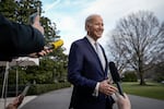 President Biden speaks with reporters at the White House on Feb. 24.