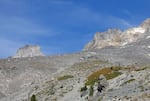 A barren field of rocky mountain with a chairlift