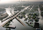 Floodwaters from Hurricane Katrina fill the streets near downtown New Orleans in August 2005.