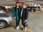 Anem Khan and Huma Shahzad, pictured in a parking garage in Dearborn on Friday, say they will be voting uncommitted in Tuesday's primary.