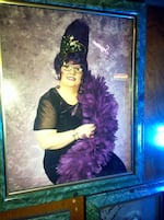 Owner Suzanne Hale, known affectionately as "The Lovely Suzanne," on the The Roxy's Hall of Fame in Portland.