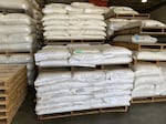 Pallets of native seeds being stored for the Klamath River restoration at BFI Native Seeds in Washington state.