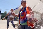 Food bank volunteers in Sheridan, Ore., on July 1 2025. The Grand Sheramina Food Bank distributes food twice monthly. More than 100 people came from rural West Yamhill County to collect food boxes.