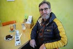 Riff co-founder Paul Evers sits at a table of dried coffee fruit products at the company's Bend, Ore., taproom on Jan. 10, 2020. 