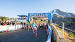 Parker Haley carries the flag for 12 Hotties and a Squatty Potty to start the 2017 Hood To Coast relay.